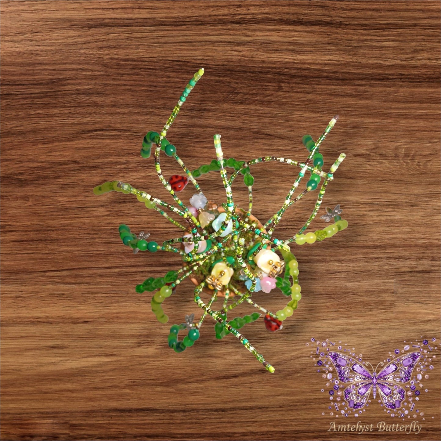 Glow-in-the-dark flower pot with charms.