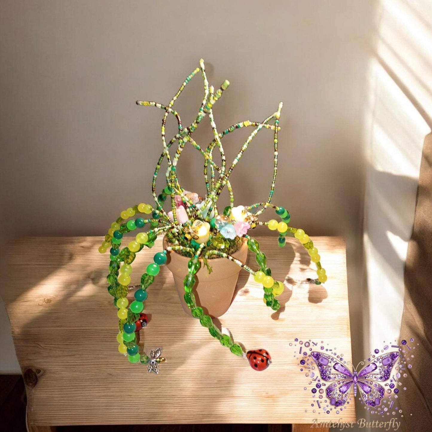 Glow-in-the-dark flower pot with charms.