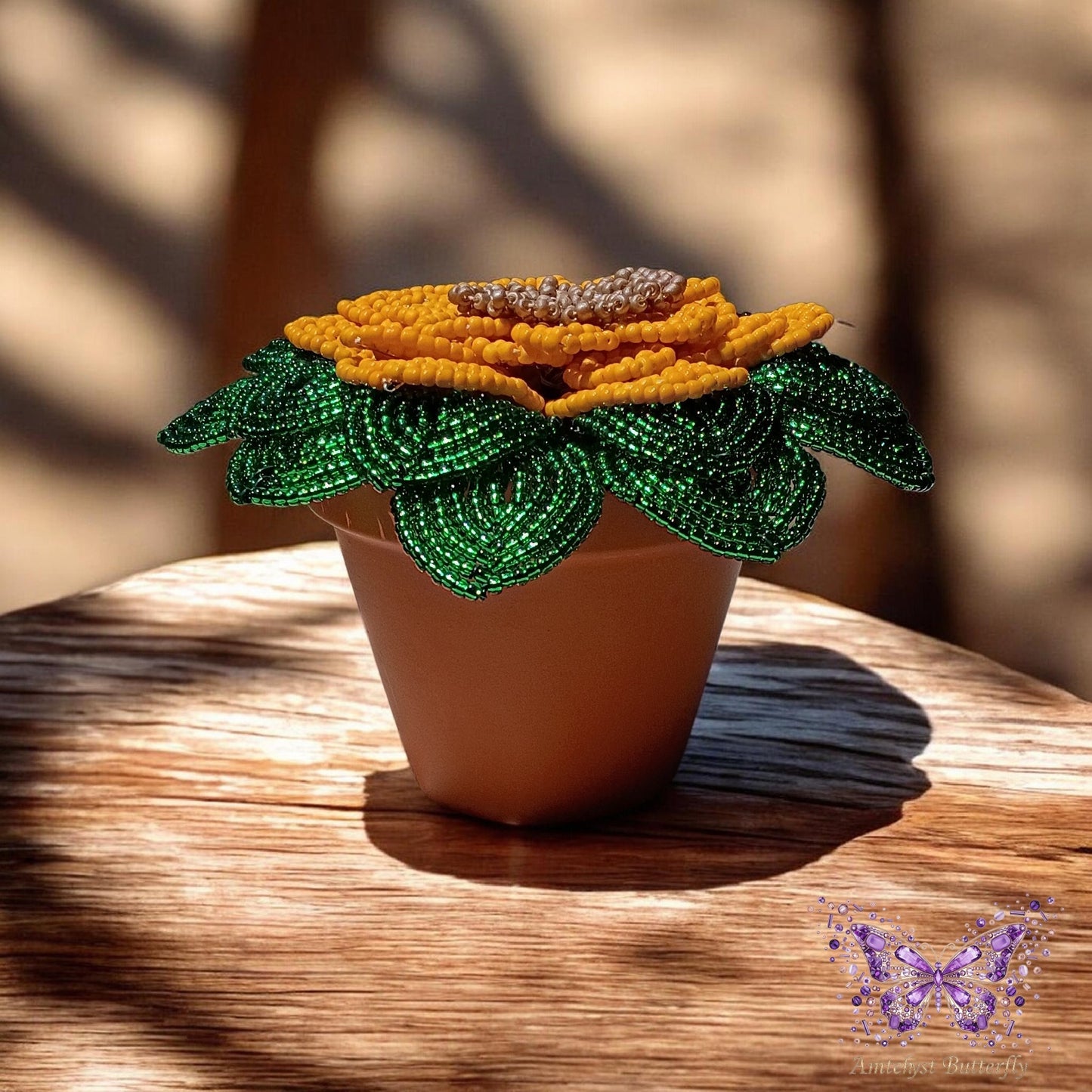Beaded sunflower in pot